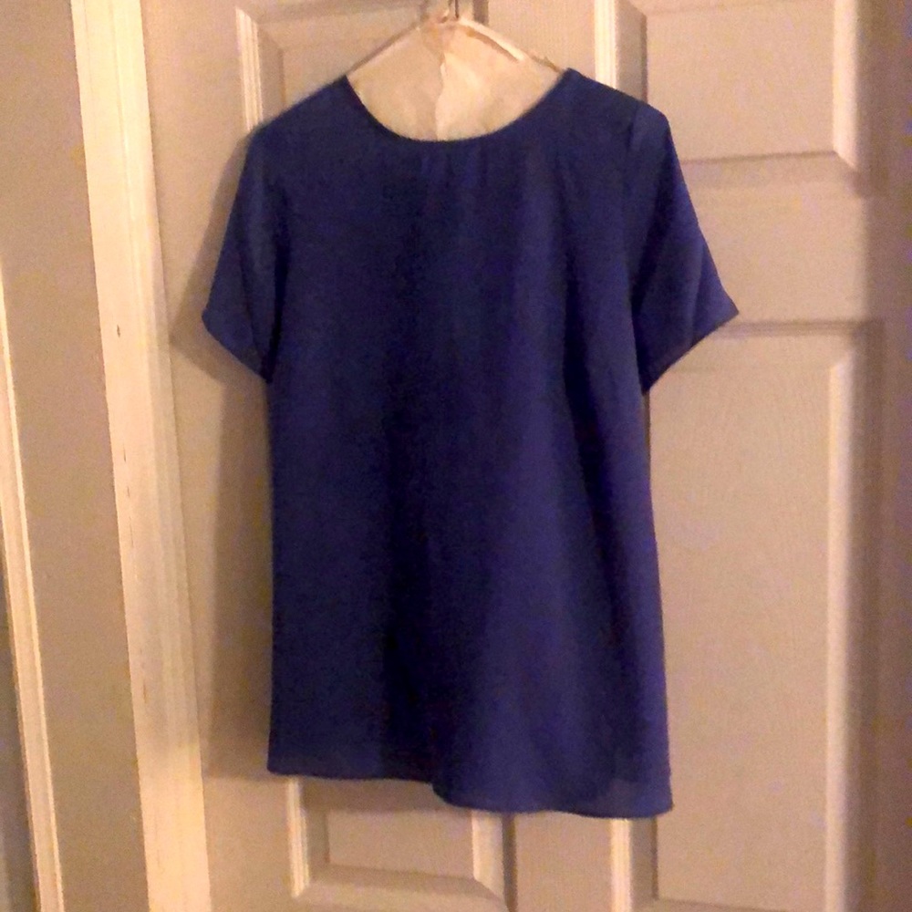Purple poly blouse types in back